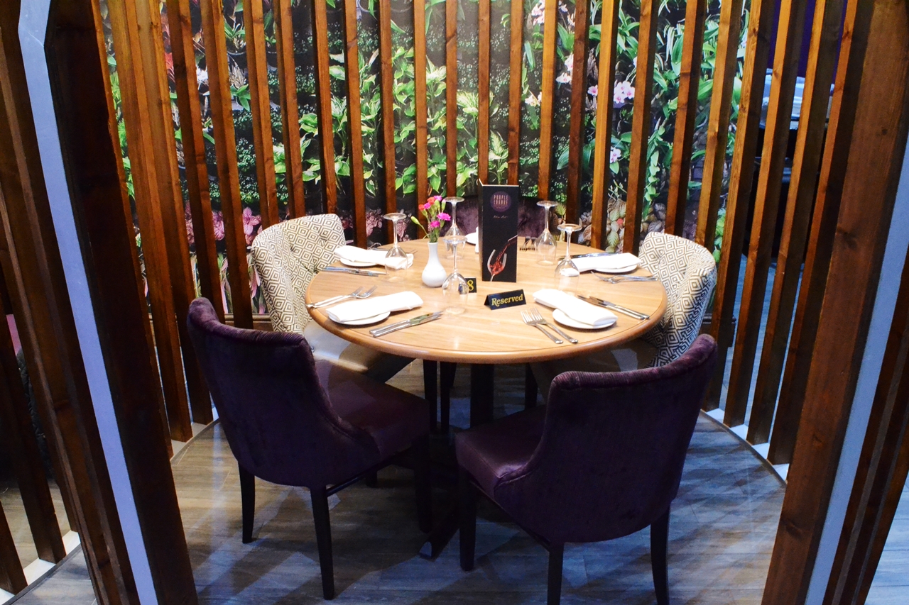 Dining Pods purple lounge wooden walkden